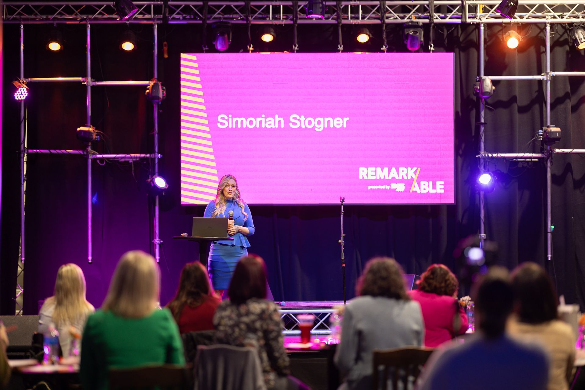Simoriah Stogner speaking to a live leadership audience